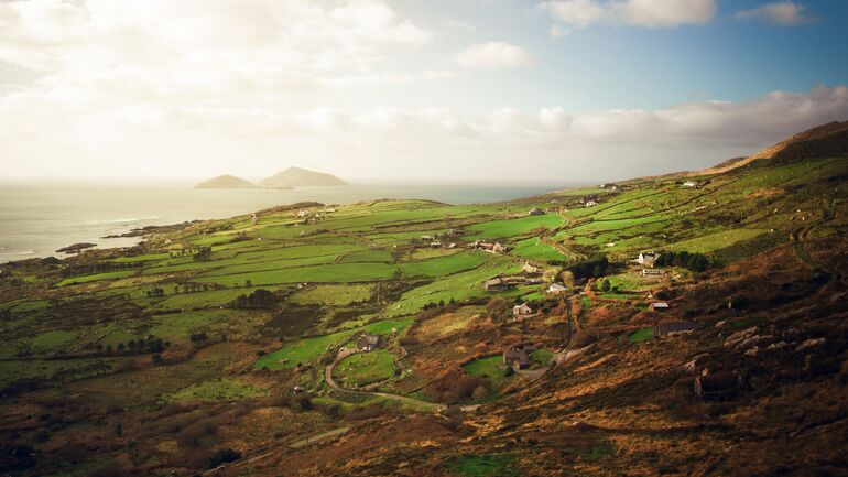 Arial shot of green countryside - Cookiebot